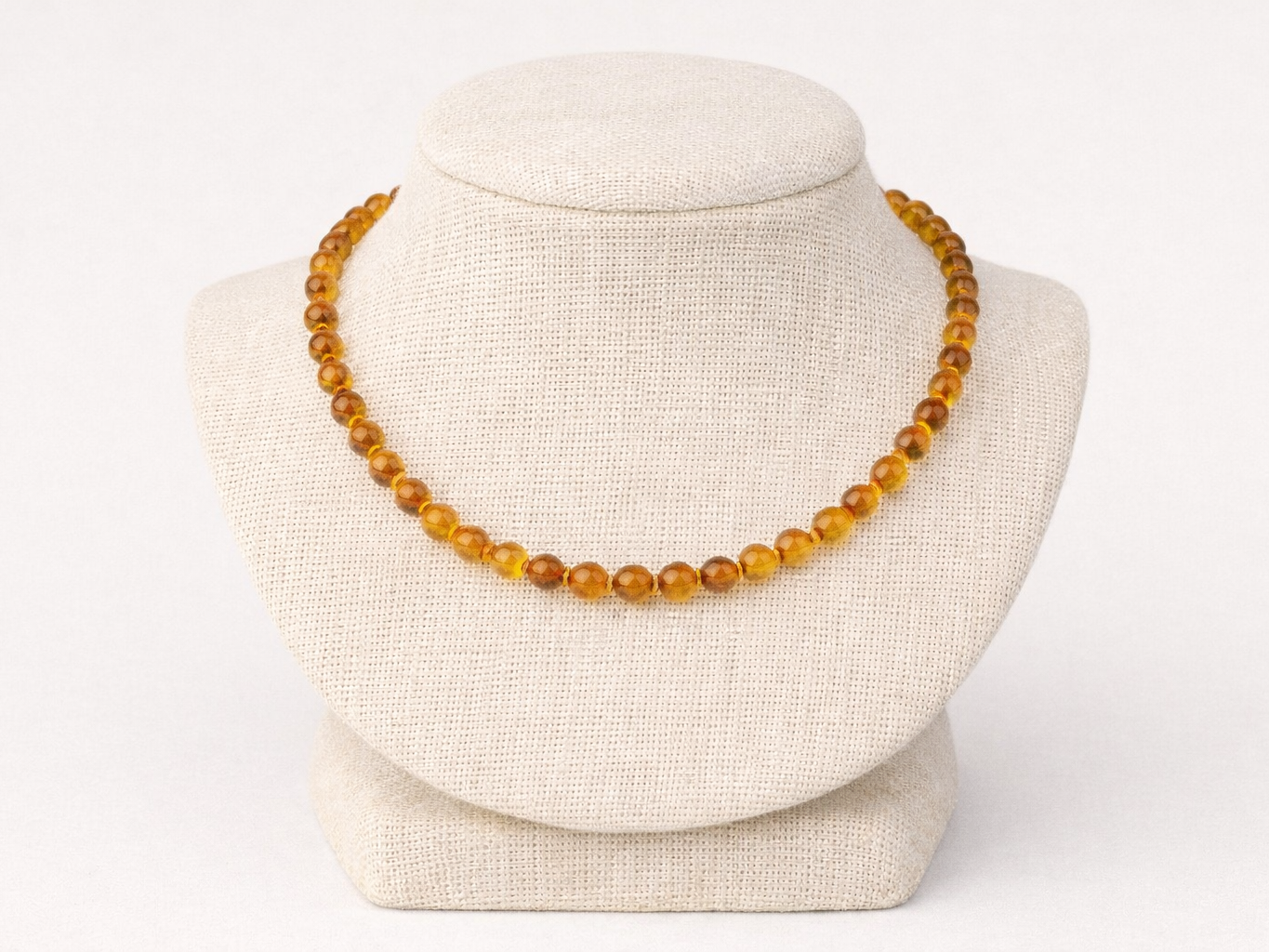 Collier Ambre sombre bébé catégorie ‘A’ perles 4mm