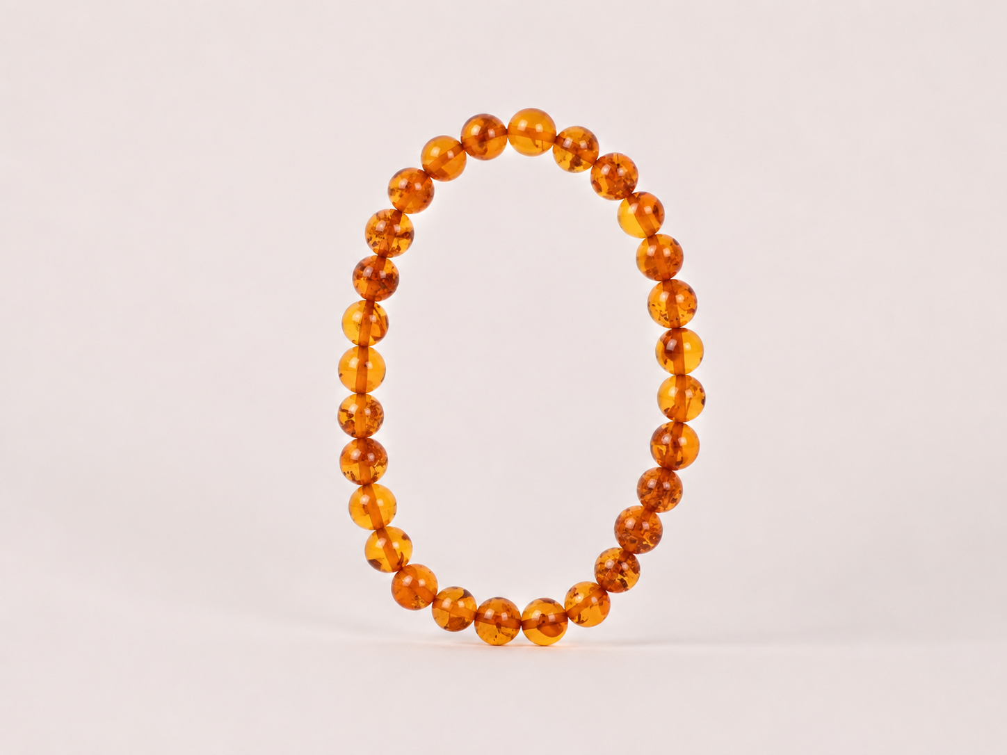 Bracelet Ambre sombre catégorie ‘A’ perles 6mm